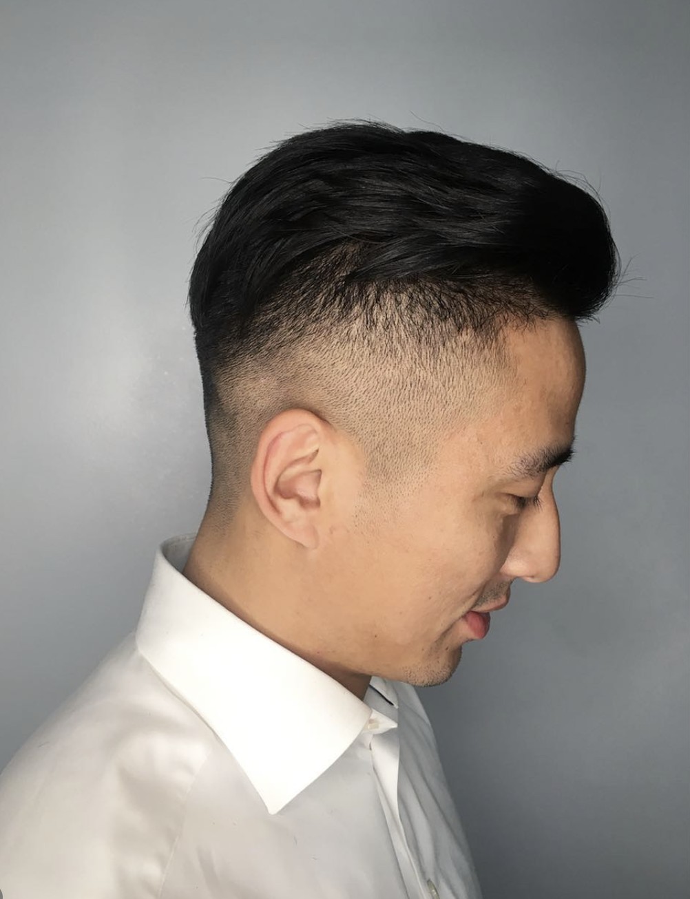 Men's fade haircut by Meo